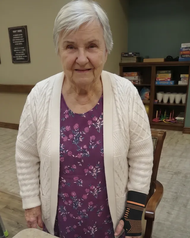 Dorothy wearing a wrist compression sleeve