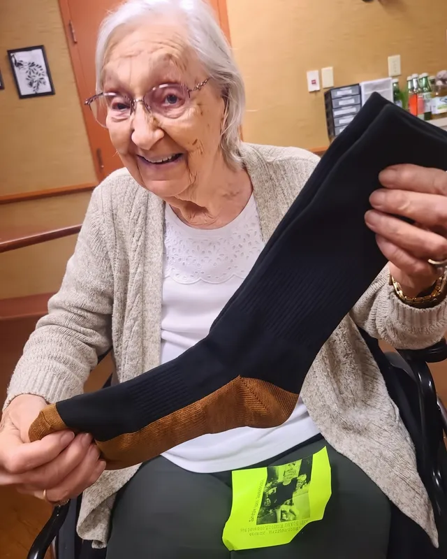 Eleanor holding up her compression socks